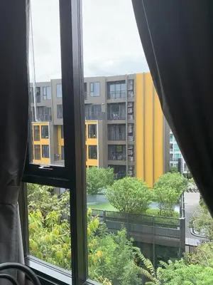 a view of a building from a window at The Base Central Phuket in Phuket Town