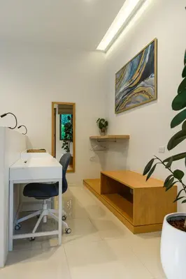 an office with a desk and a table and a plant at Villa Mimosa 1, Luxury 4BR with Private Pool/Rawai in Phuket Town