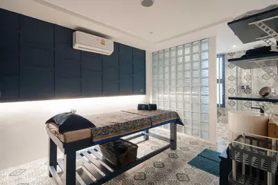 a bedroom with a bed in a room at Tropics Kamala Pool View Residence CTG B704 in Kamala Beach