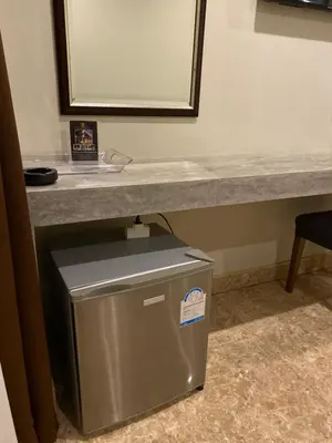 a trash can under a counter in a room at Кондо в райском уголке Равай in Rawai Beach