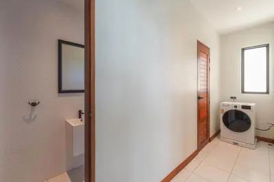 a bathroom with a toilet and a tv in it at Totally New 4BR Private Villa Sunset Garden 2, 12m Oxygen Pool in Rawai Beach