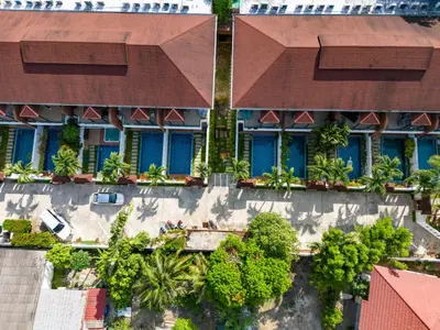 an aerial view of a building with trees at Kamala Beach 3-bedroom villa near Fantasea with high-speed Wi-Fi and private pool in Kamala Beach
