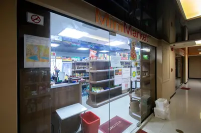 a store front of a store with a glass window at Naiharn Sea Condo by Capital Pro in Phuket Town