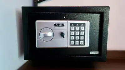 a remote control in a black box on a table at Jasmine Village in Rawai Beach