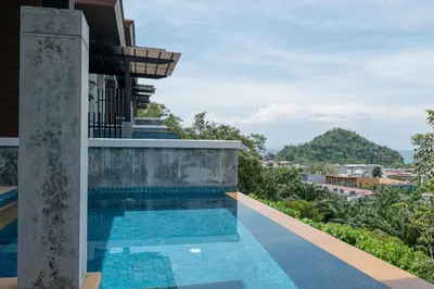 a swimming pool on the roof of a building at Aonang Suite Pool Villa in Ao Nang Beach