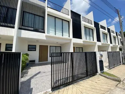 a building with a black fence in front of it at 2 bdr Townhouse in Laguna Park by CapitalPro in Phuket Town