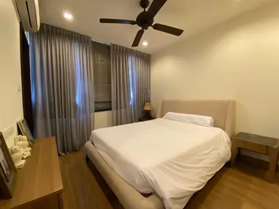 a bedroom with a white bed and a ceiling fan at 2 bdr Townhouse in Laguna Park by CapitalPro in Phuket Town