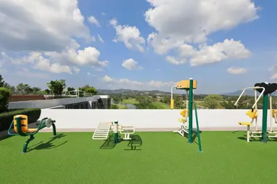 a group of playground equipment on a roof at Bangtao beach Cozy apartments by Capitalpro in Phuket Town