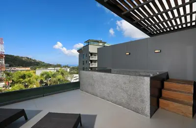 a view from the balcony of a building at 2bdr Apartment with Jacuzzi SeaView by CapitalPro 307 in Phuket Town