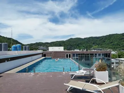 a swimming pool on the roof of a building at 7 Floor - Ozone Condotel near Kata beach by 15 minutes walking in Kata Beach