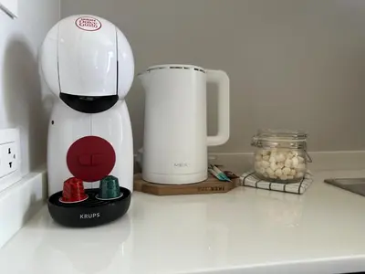 a white blender sitting on top of a counter at Great Hill Cozy Stay Pool Gym Naiyang in Phuket Town