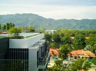 an external view of a building with a river at Skypark Laguna Rooftop Pool Apartment near Bang Tao Beach in Bang Tao Beach