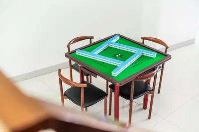 a model of a table with two chairs and a table with a table at patong villa2：四卧泳池别墅/两个海景房/近班赞酒吧街 in Patong Beach