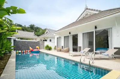 a swimming pool in the backyard of a villa at Kamala Garden View Villa 3 Bdr in Kamala Beach