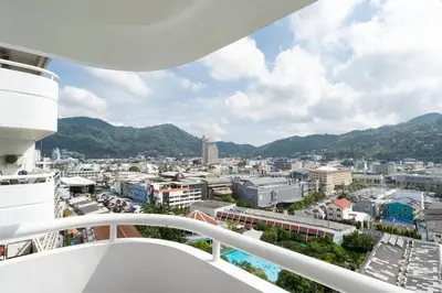 a view of the city from the balcony of a cruise ship at Patong Tower Brand New 1-Bedroom , Near Beach in Patong Beach
