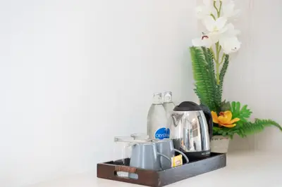 a kitchen counter with a coffee maker and a blender at Panwa Beach Side Beachfront in Panwa Beach