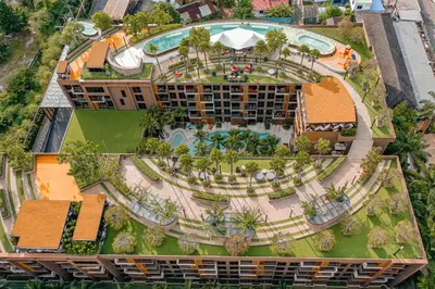 an aerial view of a resort with a swimming pool at The Marin Phuket Kamala Beach in Kamala Beach
