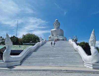 a giant buddha statue on a stairway at Private Pool Villa Nai Harn Beach in Rawai Beach