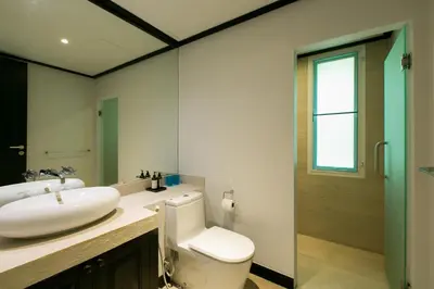 a bathroom with a white toilet and a sink at Katamanda Villa Mila A1 near Kata Beach in Kata Beach