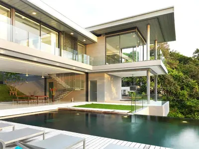 a house with a swimming pool in front of it at Villa Amanzi Kamala by Elite Havens in Kamala Beach
