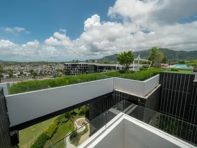 a view from the balcony of a building at Laguna SkyPark new brand apartments in Phuket Town