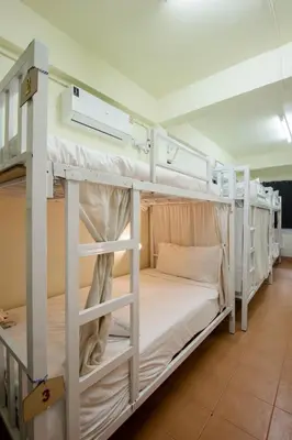 a couple of bunk beds in a room at Beds Friends Phi Phi Hostel - Party Hostel in Phi Phi Don