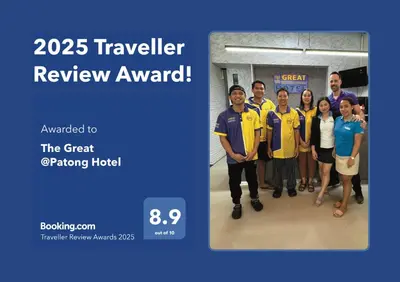 a group of people posing for a picture at The Great @Patong Hotel in Patong Beach