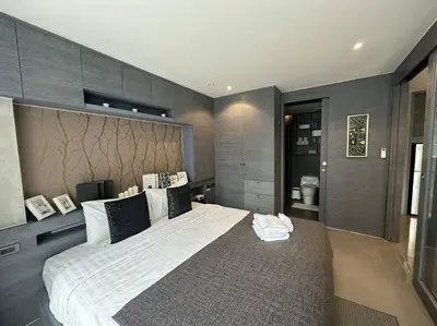 a large bedroom with a large bed in it at Luxury one apartment for rent Kamala in Kathu