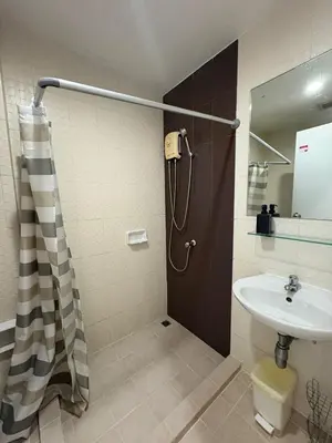 a bathroom with a shower and a sink at Zcape X2 Condos in Bangtao in Bang Tao Beach