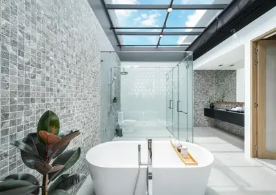 a bathroom with a white tub and a shower at New 3BR Private Pool Villa with 5 Stars Resort Service in Rawai Beach