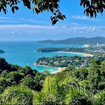 a view of a beach and the ocean at Little Mermaid Guesthouse & Restaurant in Kata Beach