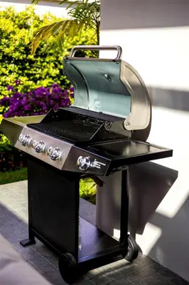 a grill sitting on top of a table at Villa Mimosa 3, Luxury 4Bedroom Private Pool-Rawai in Kata Beach