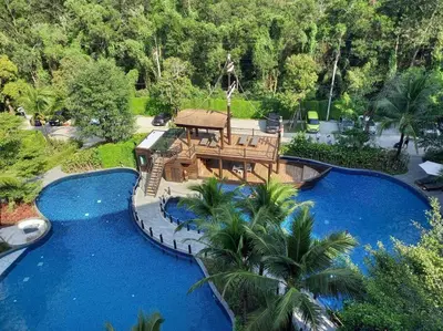 an aerial view of a resort with a blue pool at B6 НОВАЯ на БАССЕЙН ВАТСАП669З582I976 in Nai Yang Beach