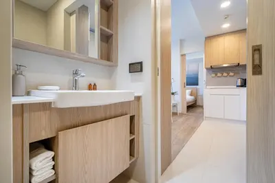 a bathroom with a sink and a toilet at Apartment in laguna , 600 metres from the beach in Phuket Town