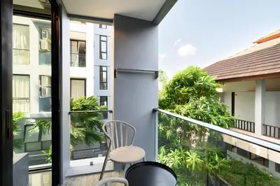 a balcony with a view of a building at City Gate Kamala D209 by Phuket Sabay Rent in Phuket Town