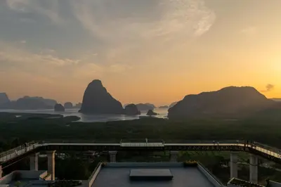 a view of the li river and mountains at sunset at Beyond Skywalk Nangshi in Ban Met Nang Chi