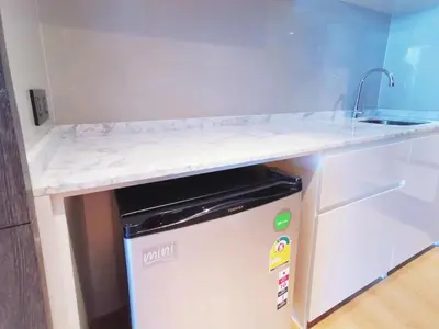 a counter top on top of a refrigerator at Water park Rawai Beach 200m Nai Han king bedroom in Rawai Beach