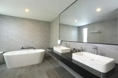 a bathroom with two sinks and a large mirror at 4bdr Pool Villa Suksan Rawai by CapitalPro SUK-20-154 in Phuket Town