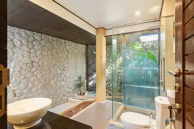 a bathroom with a glass shower and a sink at Secret Balinese Escape villla Eva in Rawai Beach