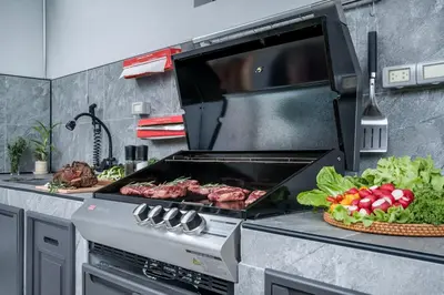 a kitchen with a grill with meat and vegetables at Two Flamingo Villa 1 in Ban Pak Lak
