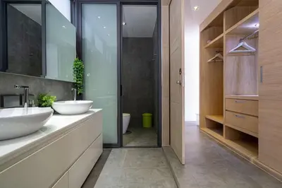 a bathroom with two sinks and a walk in shower at Serenity and Modern Art - Open Hill View 3BR Natural Park Villa 1 in Kamala Beach