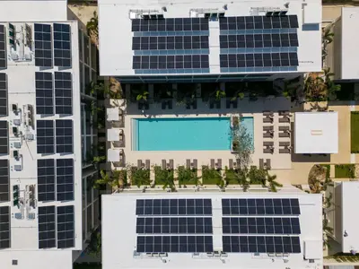 an overhead view of a building with solar panels at Niranapa Boutique Resort in Kata Beach