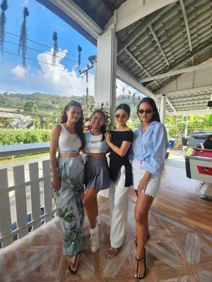 a group of women posing for a picture at Elephant Sports Bar and Accommodation in Phuket Town