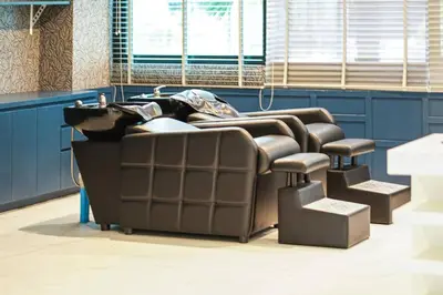 a row of reclining chairs in a waiting room at Kamala Beach P33 Pool view 2 Bedroom Suite in Kamala Beach