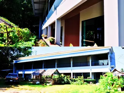 a building with a car parked in front of it at Heimat Garden Homestay in Ban Lo Pa Ret