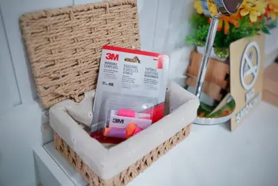 a wicker basket on a counter with a box ofmsg at Room61-รูม61 in Phuket Town