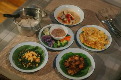 a group of plates of food on a table at Sea Sand See Sky Beach Front Resort in Phuket Town