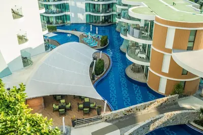 an aerial view of a swimming pool in a building at Studio with pool access - Twin Sands by Lofty in Patong Beach