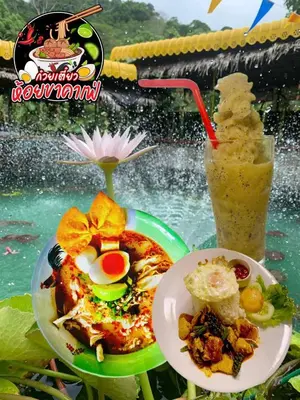 a table with a plate of food and a drink at Mountain View Resort and Phupha Srirung Resort in Phuket Town