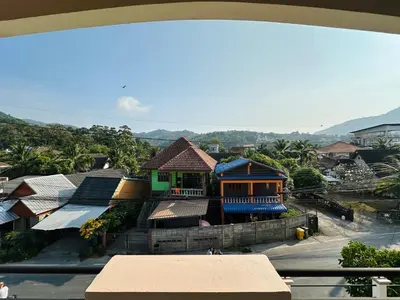a view of a town from a building at Gloria’s Home in Kamala Beach